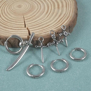 Punk style stainless steel stud earrings with sword, cross, and skull charms set