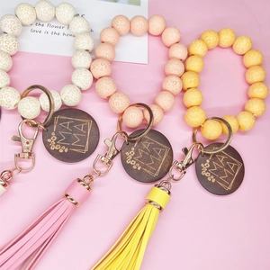 Porte-clés bracelet en perles de silicone avec imprimé léopard, pompon et bois MAMA