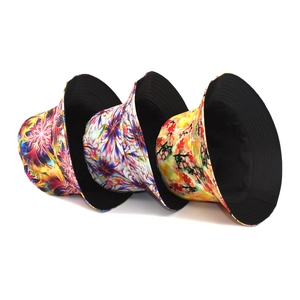 Reversible tie-dye bucket hats with artistic graffiti and floral prints for outdoors