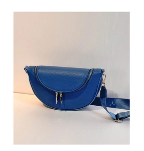 Detail of blue lychee grain leather crossbody bag with silver double zippers and wide strap