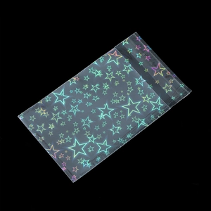 Detail of holographic star pattern on transparent self-sealing OPP jewelry bags