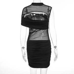 Detail of sheer mesh paneling and asymmetric cutout on this black bodycon dress