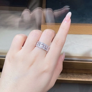 Macro detail of S925 silver wide band ring with full zircon pavé and geometric patterns