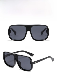 Front and 45-degree angle views of glossy black oversized sunglasses with HD lenses