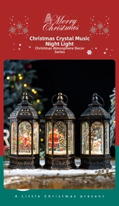 Close-up of three vintage musical Christmas lanterns with Santa and snowman scenes