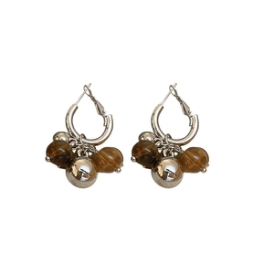 Silver drop earrings with brown resin beads and polished metal spheres in y2k retro style