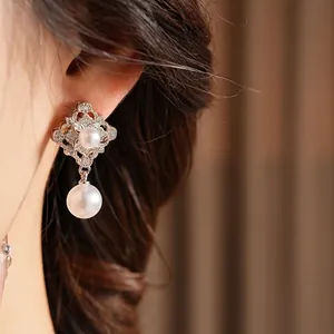 French vintage style diamond studded silver needle earrings with two white pearls