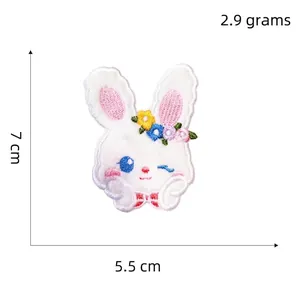 Cute white plush bunny cartoon embroidery patch with floral detail and 7cm size dimensions