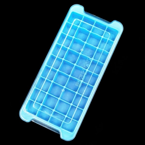 Blue BPA-free plastic ice cube tray with transparent lid on a black background