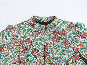 Close-up of stand-up collar and vibrant paisley print pattern on fashion cotton jacket