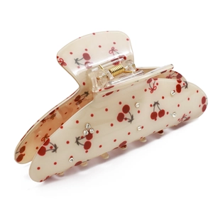 Elegant cream acetate hair claw clip with cherry patterns and sparkling rhinestones