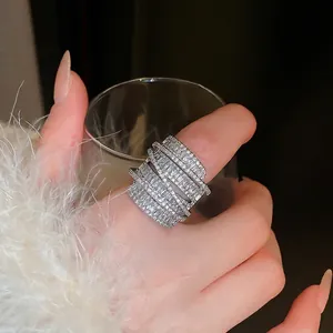 Exaggerated wide multi-layer wrap ring with cubic zirconia stones in silver finish