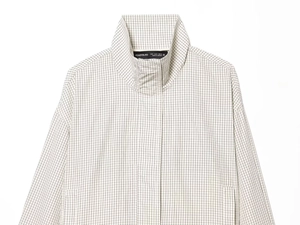 Detail of white nylon checkered jacket collar with a stand-up design and size label