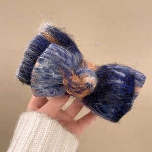 Winter plush oversized bow hair claw clip in navy blue and brown fuzzy faux fur