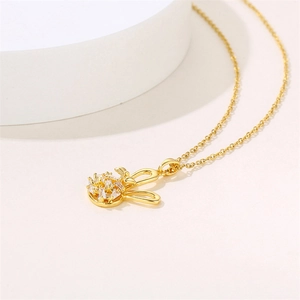 Golden rabbit pendant necklace with sparkling cubic zirconia crystals for women