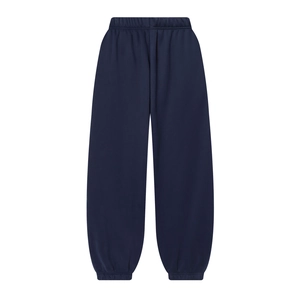 Detail view of navy blue jogger pants featuring elastic waistband and ribbed cuffs