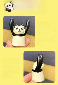 Detailed view of a cute panda figurine made of eco-friendly resin for desk decoration