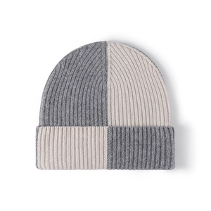 Unisex grey and beige checkered wool beanie with a thick ribbed knit texture and fold-over cuff