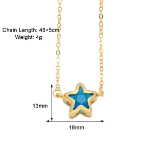 Detailed view of the blue crystal star pendant on a delicate gold-plated chain necklace