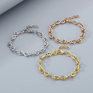 Titanium steel infinity link bracelets in silver, gold, and rose gold with lobster clasps
