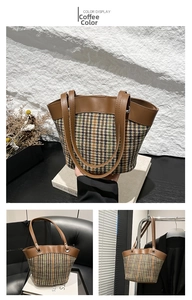Close-up of contrast stripe weave pattern and brown leather stitching on tote bag