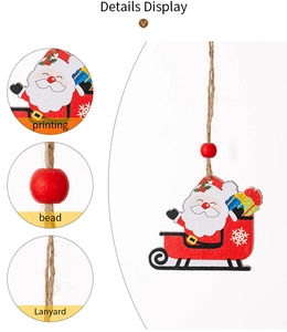 Detail display of wooden Santa sleigh hanging ornament with printing, bead and lanyard