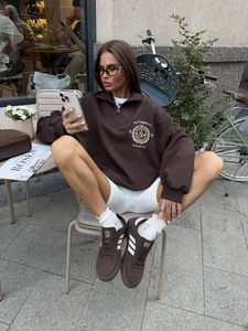 Brown vintage half-zip sweatshirt featuring authentic society embroidery and relaxed fit