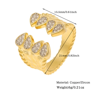 Detailed view of gold copper ring with zircon hearts and precise dimensions measurement