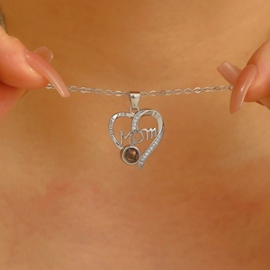 Silver MOM heart projection necklace with I Love You engraving and tiny white zircon stones
