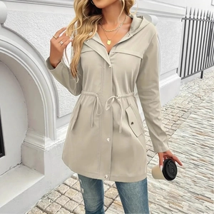 Detail of waist drawstring and metal snap buttons on a khaki hooded windbreaker jacket
