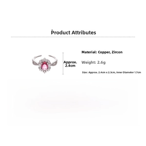 Detail view of oval pink zircon ring with dual band design in copper and cubic zirconia