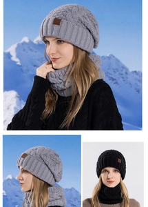 Close-up of cable knit winter hat and neck warmer set with warm fleece lining