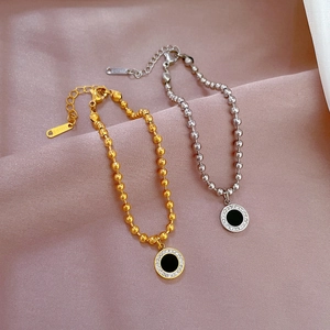 Elegant stainless steel bead bracelet set with black round pendant and crystals