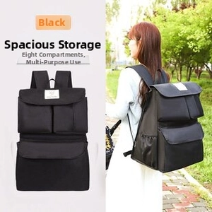 Detail of black denim multi-pocket backpack with 8 compartments for versatile storage