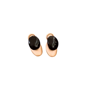 Minimalist black and rose gold oval stud earrings with geometric lacquer finish