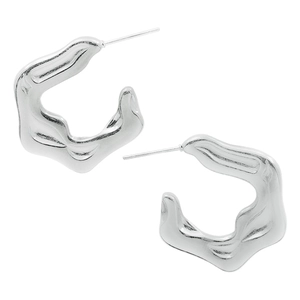 Macro detail of silver irregular wavy hoop earrings in polished 304 stainless steel
