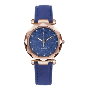 Elegant rose gold starry sky watch with blue leather strap and geometric cut glass