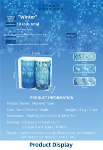 Detail view of winter washi tape set featuring gold stamping with deer and snowflake patterns