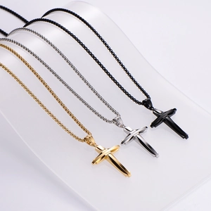 Three men's stainless steel double cross necklaces in gold, silver, and black colors