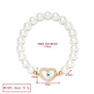 Detaillierte Ansicht der Maße des Perlenarmbands mit Herz-Anhänger und Evil Eye Motiv
