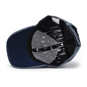 Internal structure of the baseball cap showing sweatband and polyester fabric label