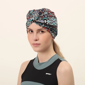 Bohemian geometric turban headwrap with vintage pattern and front twist knot detail