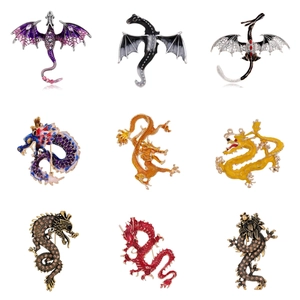 Collection of nine vintage enamel dragon brooches with crystals for suits and coats