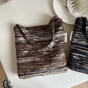 Vintage style woven tote bag with textured stripes and minimalist simple wish side label