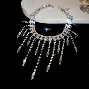 Elegant silver-toned rhinestone fringe necklace with long tassels and marquise stones
