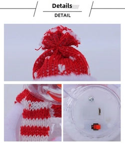 Detail of the snowman ornament base showing the power switch and battery compartment