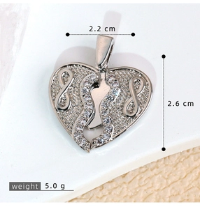 Detailed view of silver heart pendant with infinity wings and size measurements