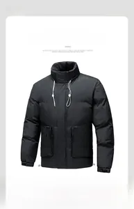 Detail of winter puffer jacket featuring stand collar with white drawstring and utility pockets