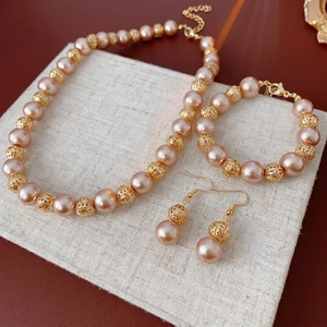Champagne pearl and hollow gold bead jewelry set with necklace bracelet and earrings