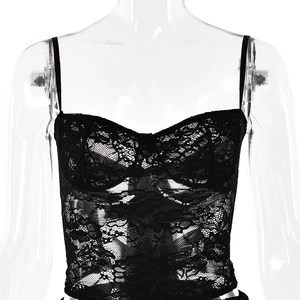 Detailed close-up of the black lace corset top with delicate floral embroidery details